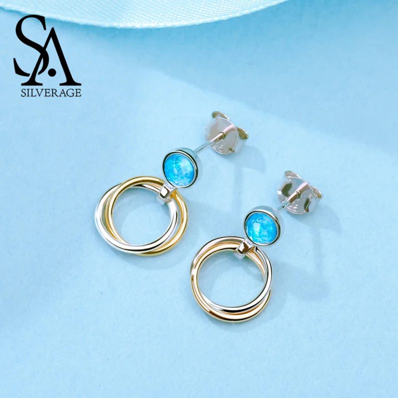 SA SILVERAGE 925 Sterling Silver Blue Opal Stone Drop Earrings for Woman 925 Silver 14K Gold Plated Earring Round Circle Earring
SA SILVERAGE 925 Sterling Silver Blue Opal Stone Drop Earrings for Woman 925 Silver 14K Gold Plated Earring Round Circle Earring