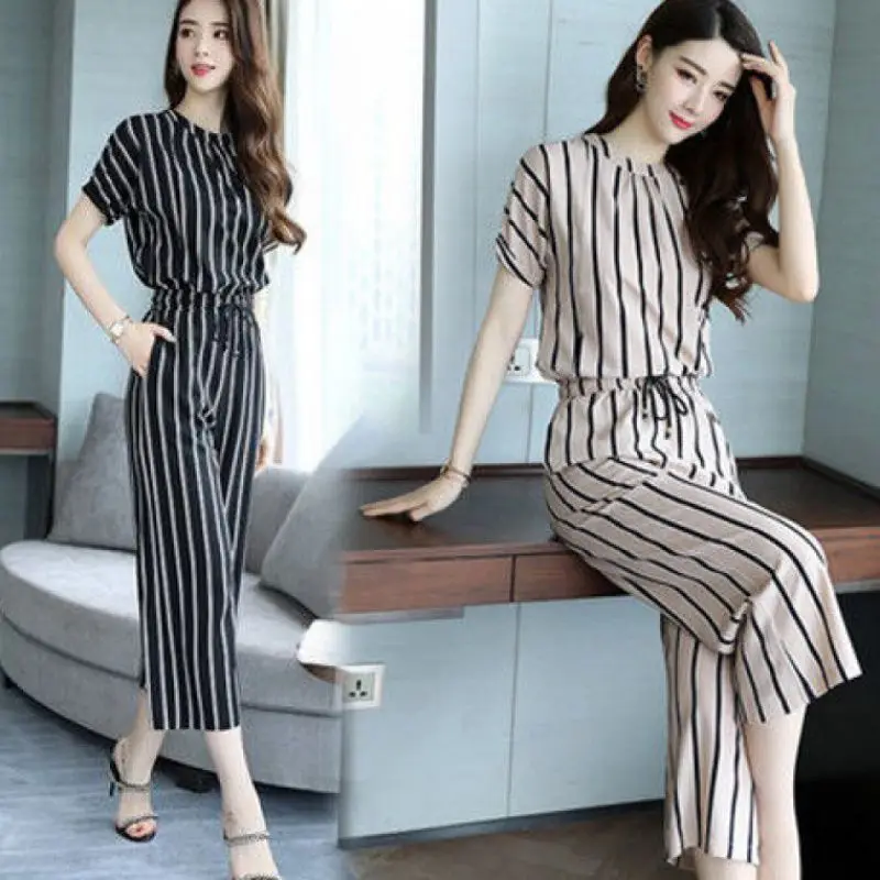 Summer New 2019 Women Fashion Stripe Two Pieces Sets Female Round Neck Tops and Ankle Length Pants Sets Woman Casual Suits 
Summer New 2019 Women Fashion Stripe Two Pieces Sets Female Round Neck Tops and Ankle Length Pants Sets Woman Casual Suits