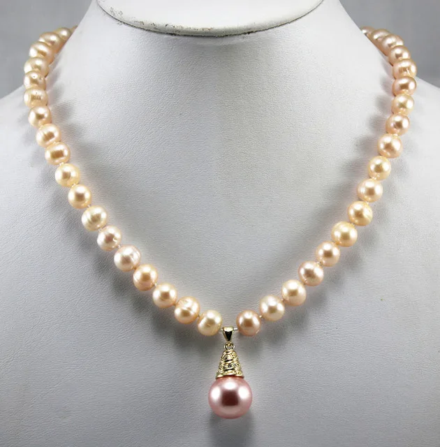 simplest fashion design! wholesale/retail 8mm yellow shell pearl necklace+14mm pink pearl pendant
simplest fashion design! wholesale/retail 8mm yellow shell pearl necklace+14mm pink pearl pendant