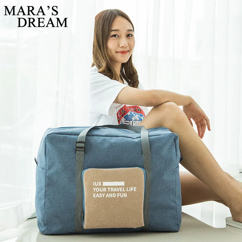 Mara's Dream Unisex travel bag trend can fold large capacity Women canvas bag casual solid color Multifunction storage bag
Mara's Dream Unisex travel bag trend can fold large capacity Women canvas bag casual solid color Multifunction storage bag