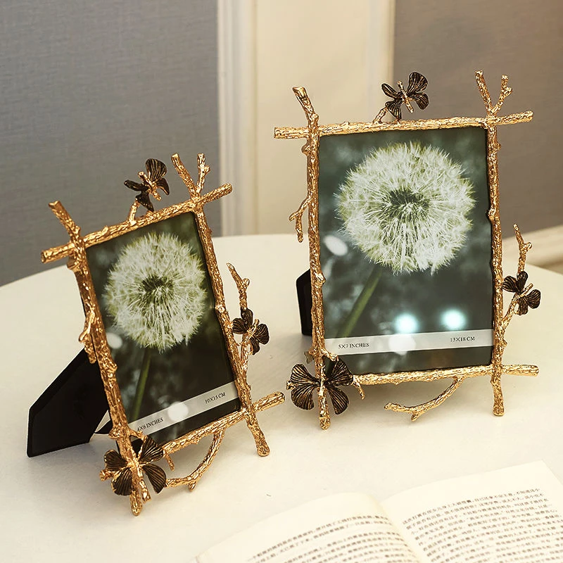 Europe Metal Alloy photo frame 6 inch 7 inch Golden butterfly picture frame table top Light luxury photo frame Home decoration
Europe Metal Alloy photo frame 6 inch 7 inch Golden butterfly picture frame table top Light luxury photo frame Home decoration
