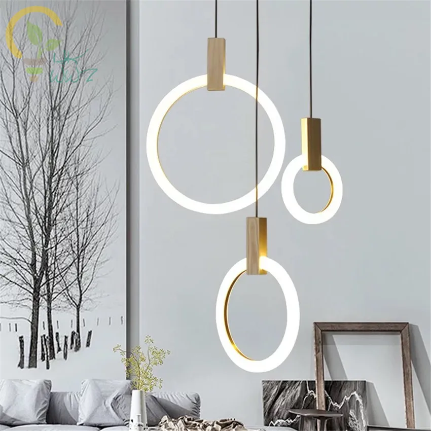 Modern Wood Led Pendant Lights For Lobby Dining Room Acrylic Ring Arts Decoration lighting Antique Gold suspension Pendant Lamp
Modern Wood Led Pendant Lights For Lobby Dining Room Acrylic Ring Arts Decoration lighting Antique Gold suspension Pendant Lamp