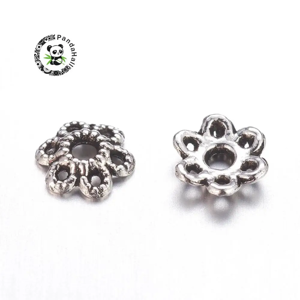 6-Petal Tibetan Style Alloy Hollow Flower Bead Caps, Lead Free , Antique Silver Color, 6x1.5mm, Hole: 2mm
6-Petal Tibetan Style Alloy Hollow Flower Bead Caps, Lead Free , Antique Silver Color, 6x1.5mm, Hole: 2mm