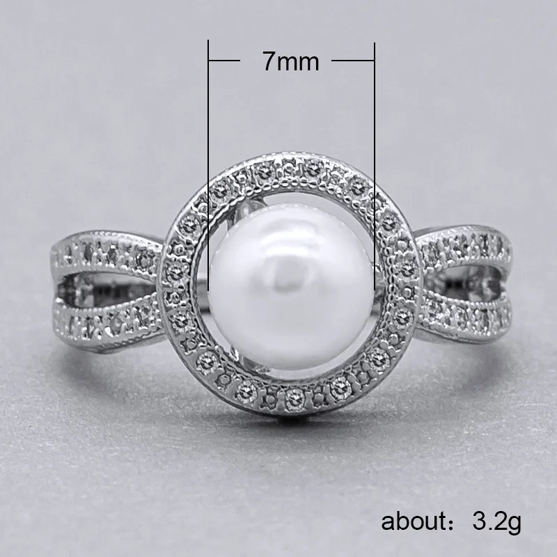 Huitan Stylish Solitaire Ring with White Simulated Pearl Design Birthstone Jewelry Brilliant CZ Engagement Rings for Women Girls 
Huitan Stylish Solitaire Ring with White Simulated Pearl Design Birthstone Jewelry Brilliant CZ Engagement Rings for Women Girls