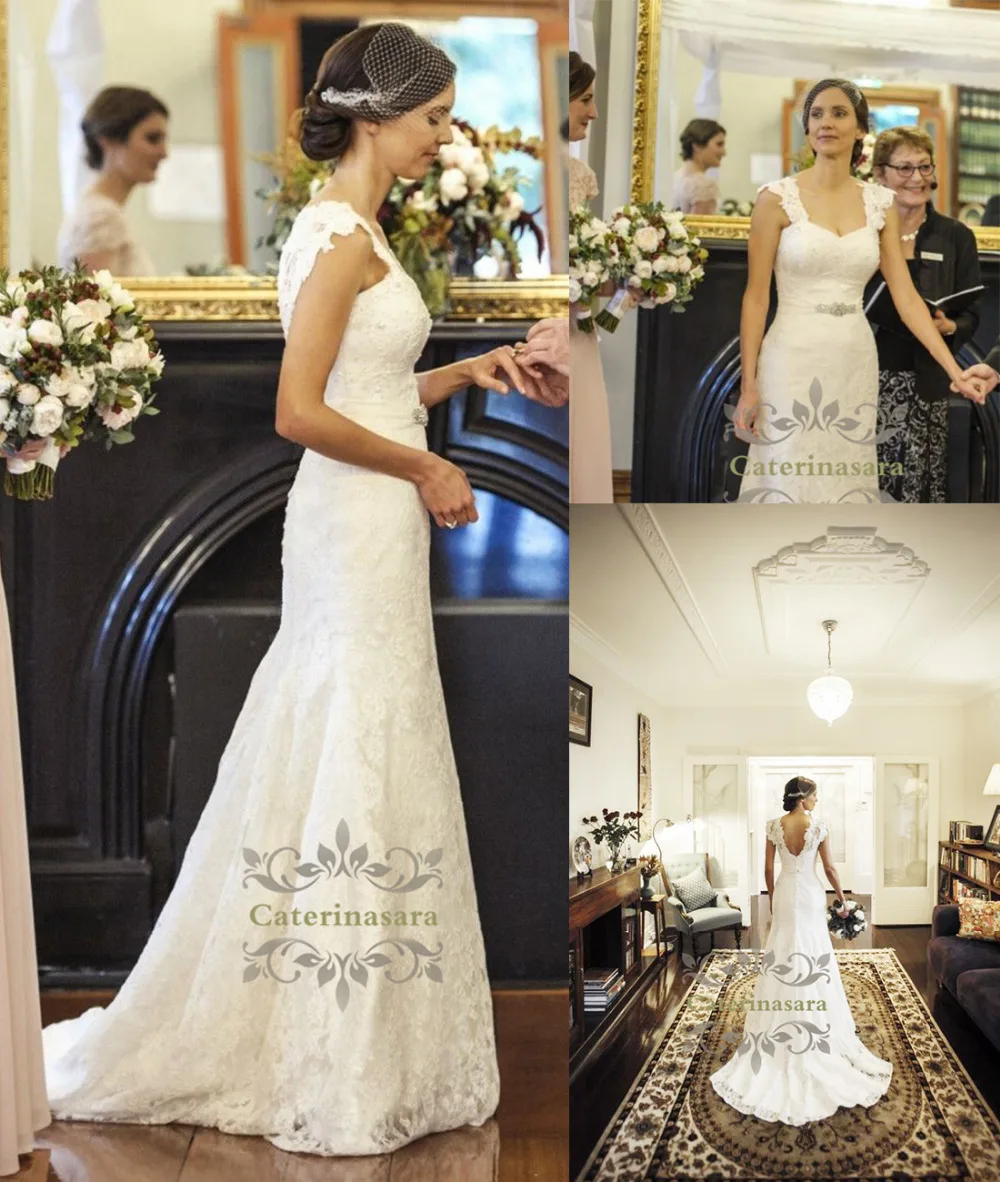 Cap Sleeves Good Quality Lace Wedding Dresses Mermaid Bride Gowns with Crystals Sashes Elegant Long Bridal Dress
Cap Sleeves Good Quality Lace Wedding Dresses Mermaid Bride Gowns with Crystals Sashes Elegant Long Bridal Dress