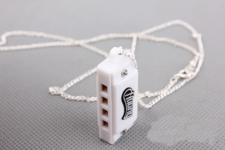 Mini White Little Harmonica 4 Hole Small Key Children Learning & Exercising Type Plastic Educational Whistling Unisex 2021
Mini White Little Harmonica 4 Hole Small Key Children Learning & Exercising Type Plastic Educational Whistling Unisex 2021