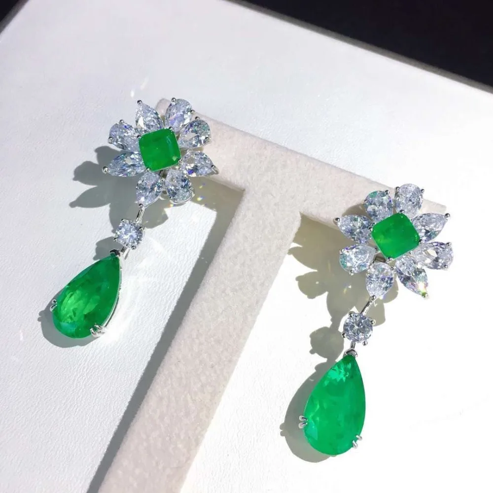 green color 925 sterling silver with cubic zircon drop earring flower tear drop shape fine women jewelry for party 22*47MM
green color 925 sterling silver with cubic zircon drop earring flower tear drop shape fine women jewelry for party 22*47MM