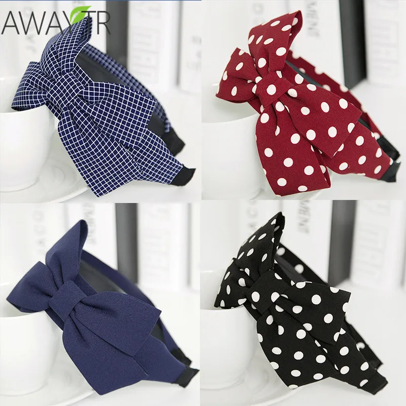 Женская широкая лента для волос с большим бантом
Женская широкая лента для волос с большим бантом