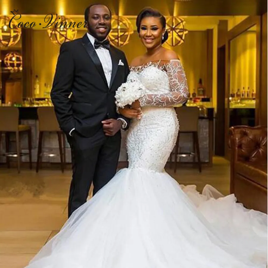 Lace Embroidery Appliques Mermaid Wedding Dresses Africa Style Off Shoulder Long Sleeve Crystal Beads Wedding dress W0400
Lace Embroidery Appliques Mermaid Wedding Dresses Africa Style Off Shoulder Long Sleeve Crystal Beads Wedding dress W0400