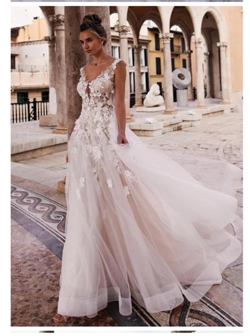 LORIE Princess Wedding Dress 2019 V Neck Appliqued with Flowers A-Line Tulle Backless Boho Wedding Gown Bride Dress
LORIE Princess Wedding Dress 2019 V Neck Appliqued with Flowers A-Line Tulle Backless Boho Wedding Gown Bride Dress