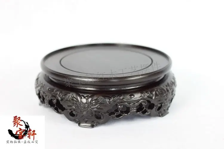 Special offer ebony wood carving of Buddha carved mahogany handicraft circular base vase furnishing articles
Special offer ebony wood carving of Buddha carved mahogany handicraft circular base vase furnishing articles