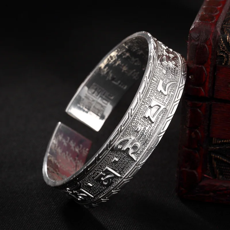 S999 fine silver silver Sanskrit six words heart sutra Thai silver restoring ancient ways open lady bracelet wholesale
S999 fine silver silver Sanskrit six words heart sutra Thai silver restoring ancient ways open lady bracelet wholesale