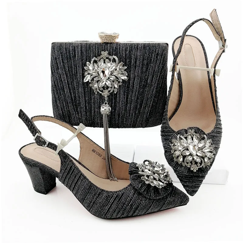 2019 Fashion Design African Ladies Shoes and Bags To Match Set with Rhinestone Nigerian Wedding Party in Black color
2019 Fashion Design African Ladies Shoes and Bags To Match Set with Rhinestone Nigerian Wedding Party in Black color