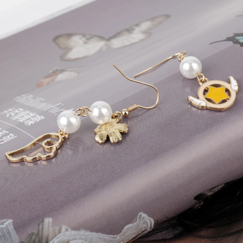 Fashion Jewelry Accessories Metal Enamel Angel Wing Star Heart Card Captor Sakura Dangle Earring Women Girl Cosplay Party Gift
Fashion Jewelry Accessories Metal Enamel Angel Wing Star Heart Card Captor Sakura Dangle Earring Women Girl Cosplay Party Gift
