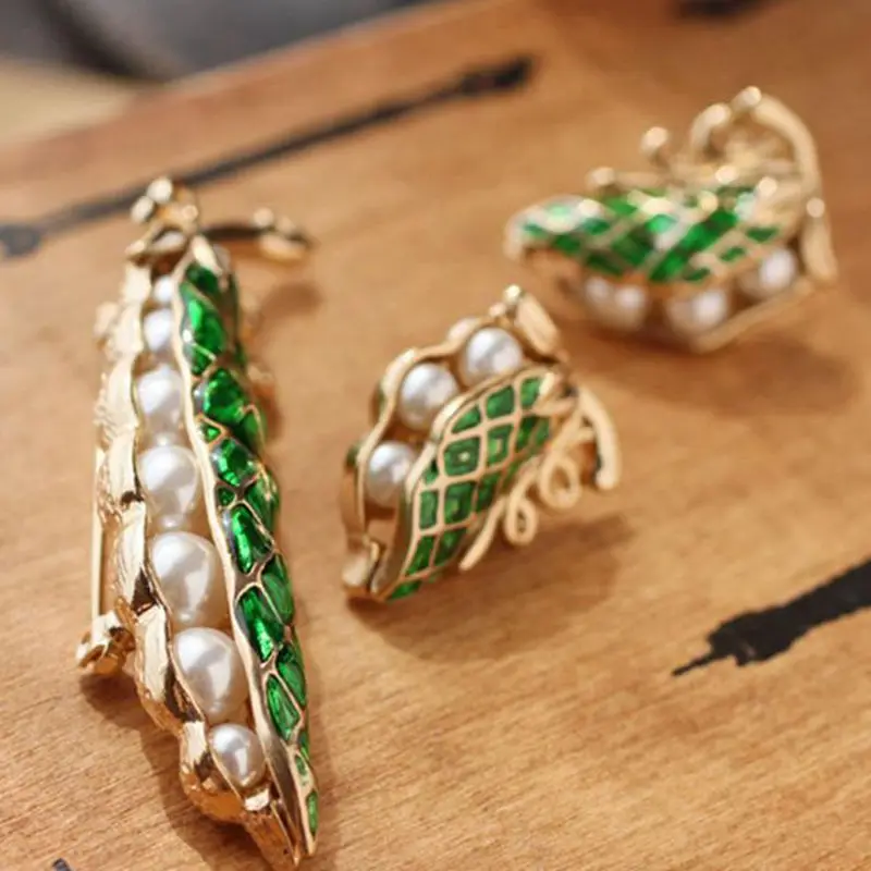 2018 new plant flowers and ornaments, European and American jewelry, antique, green enamel, pearl pea pods, popular femal
2018 new plant flowers and ornaments, European and American jewelry, antique, green enamel, pearl pea pods, popular femal