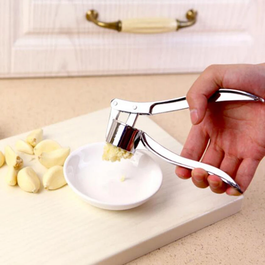 Metal Garlic Press Fashion Design Presser and Crusher Portable Garlic Mincer Chopper Crusher Slicer Grater with Great Handle
Metal Garlic Press Fashion Design Presser and Crusher Portable Garlic Mincer Chopper Crusher Slicer Grater with Great Handle