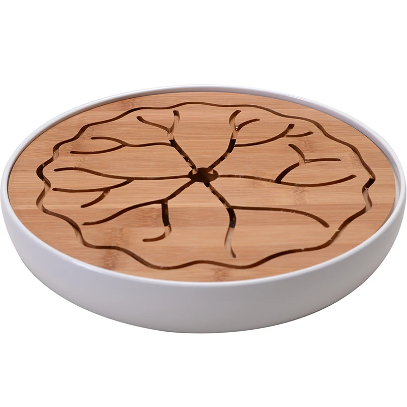 Tea tray The cabinet ceramic water circular dry tea tea tray home small office tea bamboo set
Tea tray The cabinet ceramic water circular dry tea tea tray home small office tea bamboo set