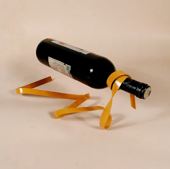 1PC Magic Suspension Ribbon Wine Rack Suspension Wine Stand Novelty Iron Rack Bottle Holder Stand Bar Wedding Whiskey KI 2077
1PC Magic Suspension Ribbon Wine Rack Suspension Wine Stand Novelty Iron Rack Bottle Holder Stand Bar Wedding Whiskey KI 2077