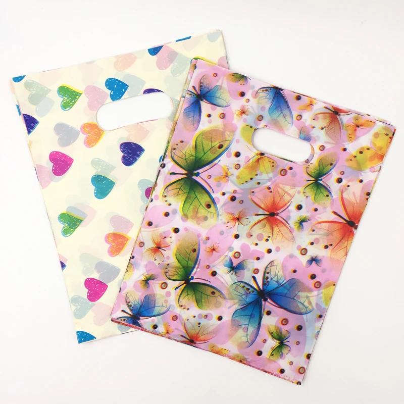 100pcs / Lot Plastic Candy Gft Bags Mix ColorButterflies and Love Plastic Bags With Handle Jewelry Packaging 15*20cm Z268
100pcs / Lot Plastic Candy Gft Bags Mix ColorButterflies and Love Plastic Bags With Handle Jewelry Packaging 15*20cm Z268