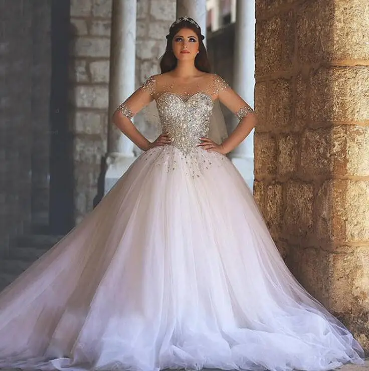 Роскошное бальное платье с кристаллами vestido de noiva, свадебное платье Дубай с круглым вырезом, белое платье с полурукавами, свадебное платье
Роскошное бальное платье с кристаллами vestido de noiva, свадебное платье Дубай с круглым вырезом, белое платье с полурукавами, свадебное платье