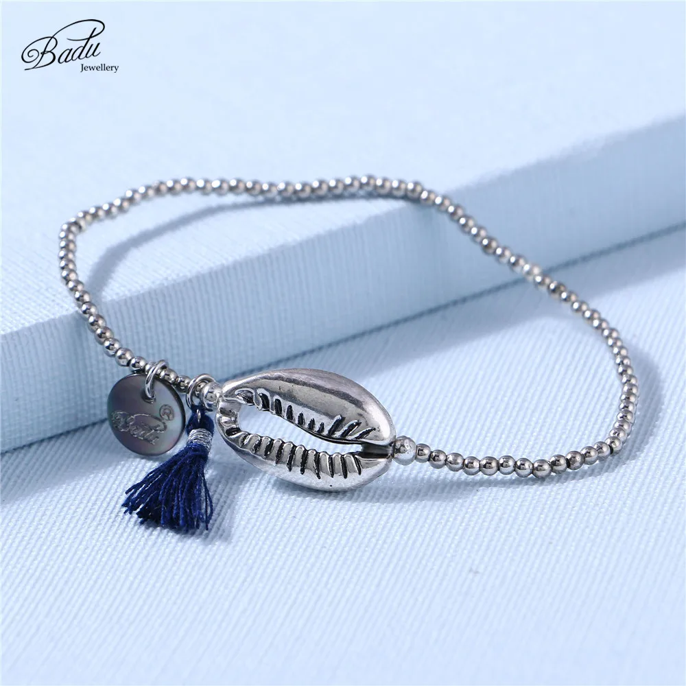 Badu Shell Bracelet for Women Alloy Beads Elastic String Cotton Tassel Pendant Handmade Charming Bracelets Wholesale
Badu Shell Bracelet for Women Alloy Beads Elastic String Cotton Tassel Pendant Handmade Charming Bracelets Wholesale