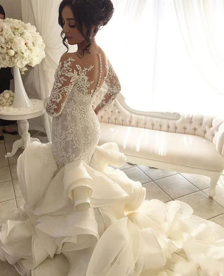 Saudi Arabic Lace Mermaid Wedding Gowns With Full Sleeves 2020 Wedding Bridal Dresses Dubai Button Ruffles Robe De Mariage
Saudi Arabic Lace Mermaid Wedding Gowns With Full Sleeves 2020 Wedding Bridal Dresses Dubai Button Ruffles Robe De Mariage