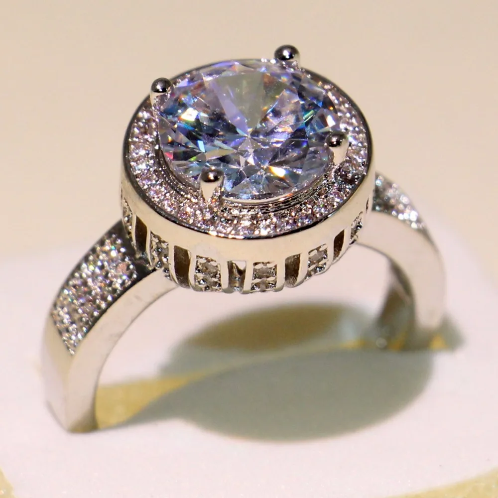 Dazzling Crown Wedding band Ring Round Cut 5A Cubic Zirconia Pave CZ 925 Sterling Silver Promise Jewelry Finger Ring for Women
Dazzling Crown Wedding band Ring Round Cut 5A Cubic Zirconia Pave CZ 925 Sterling Silver Promise Jewelry Finger Ring for Women