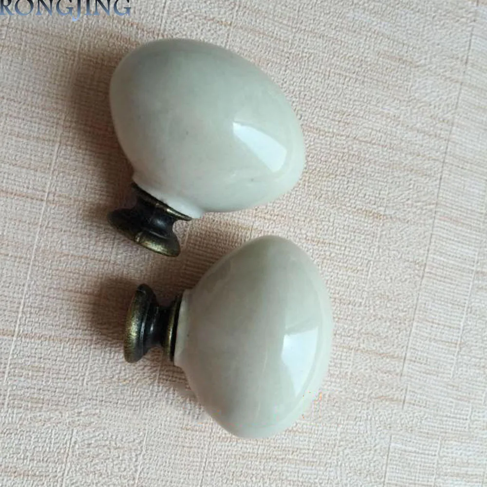 10pcs Egg-shaped Ceramic Knobs Kids Cabinet Knob Cupboard Handles Procelain Kitchen Knobs Handles Rural Furniture Drawer Pulls
10pcs Egg-shaped Ceramic Knobs Kids Cabinet Knob Cupboard Handles Procelain Kitchen Knobs Handles Rural Furniture Drawer Pulls