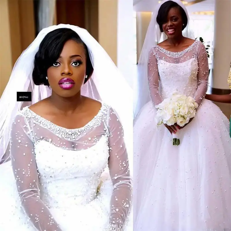 2021 Black Girl African Wedding Dress Ball Gowns Long Sleeves Muslim Appliques Pearls Collar Princess Bridal Gowns sweep train
2021 Black Girl African Wedding Dress Ball Gowns Long Sleeves Muslim Appliques Pearls Collar Princess Bridal Gowns sweep train