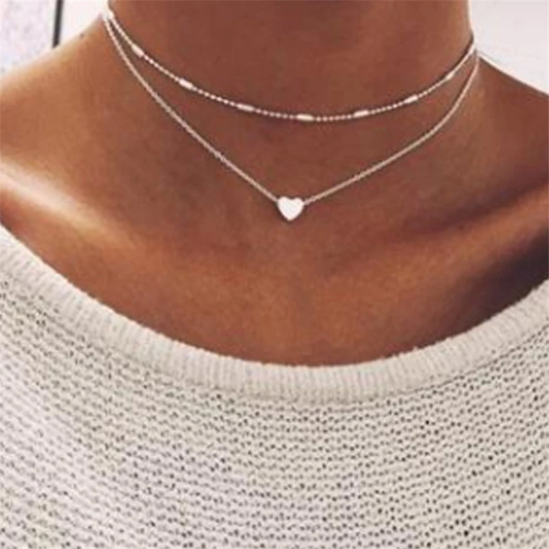 Винтажное крошечное ожерелье сердца для женщин короткая цепочка сердце брелок ожерелье подарок этническое богемское Колье чокер Прямая по...
Винтажное крошечное ожерелье сердца для женщин короткая цепочка сердце брелок ожерелье подарок этническое богемское Колье чокер Прямая по...
