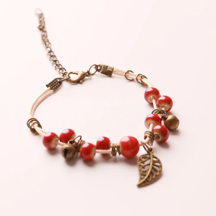 Ceramic Bracelet glazed beads retro-red beads hand-woven National Style Bronze leaf belt copper bell accessories Bracelet gift
Ceramic Bracelet glazed beads retro-red beads hand-woven National Style Bronze leaf belt copper bell accessories Bracelet gift