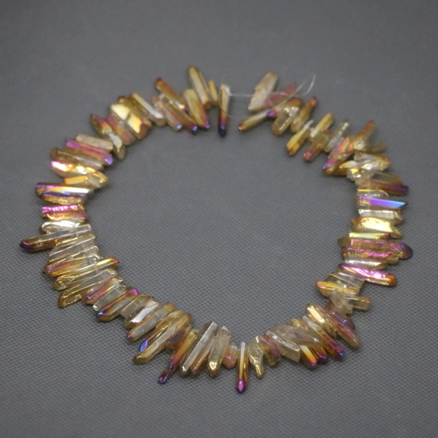 58pcs/strand Raw Crystals Points Bulk, Champagne Mystic Titanium Quartz Top Drilled Smooth Stick Beads Pendants 5-8*15-25mm
58pcs/strand Raw Crystals Points Bulk, Champagne Mystic Titanium Quartz Top Drilled Smooth Stick Beads Pendants 5-8*15-25mm