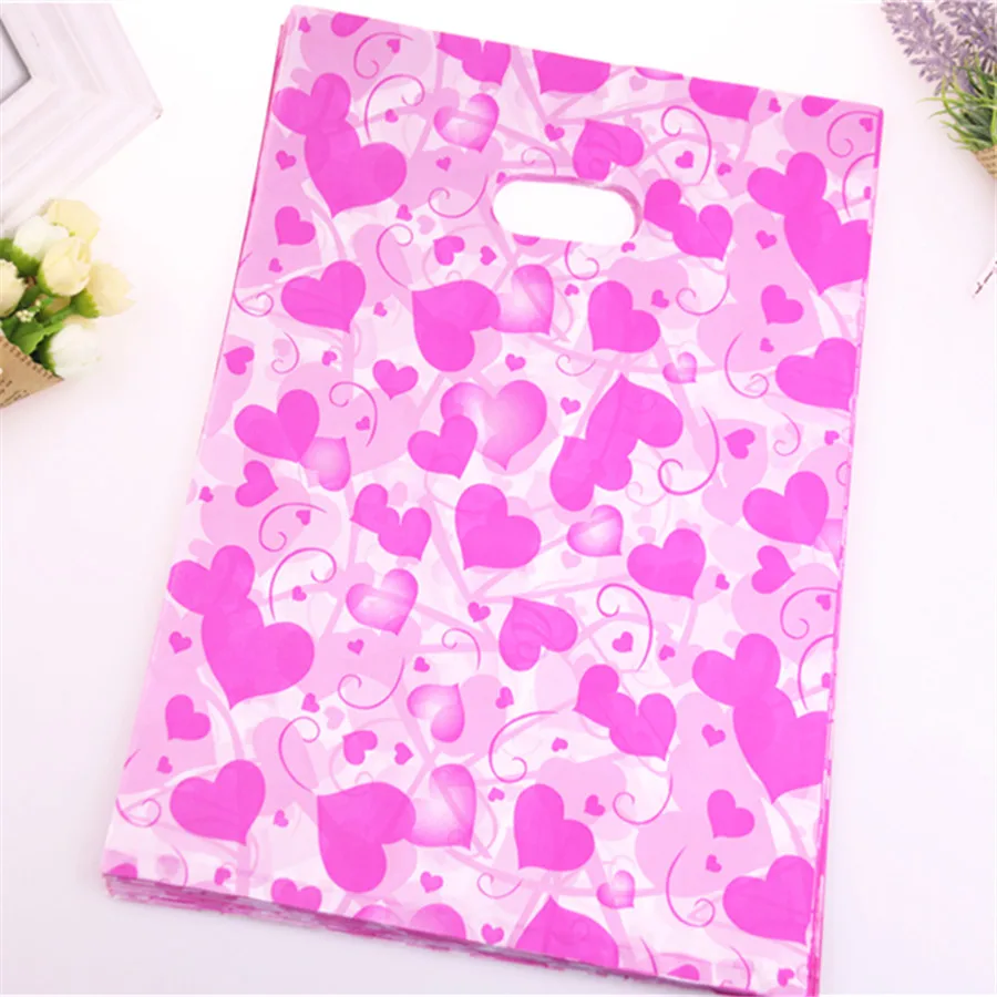 New Design Wholesale 100pcs/lot 25*35cm Fashion Hot Pink Lovely Heart Wedding Decoraction Packaging Bags Plastic Gift Bags
New Design Wholesale 100pcs/lot 25*35cm Fashion Hot Pink Lovely Heart Wedding Decoraction Packaging Bags Plastic Gift Bags
