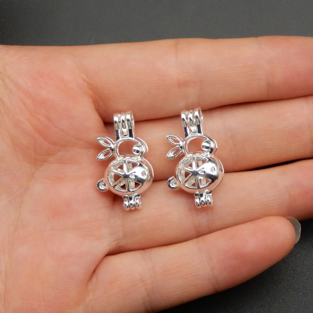 10pcs bright silver rabbit pearl cage necklace pendant, aroma oil diffuser adds your own pearl, stone makes it more attractive.
10pcs bright silver rabbit pearl cage necklace pendant, aroma oil diffuser adds your own pearl, stone makes it more attractive.
