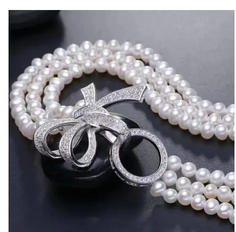 Wholesale price Dainashi classic White 7-8mm natural south sea white pearl necklace 18" 925
Wholesale price Dainashi classic White 7-8mm natural south sea white pearl necklace 18" 925