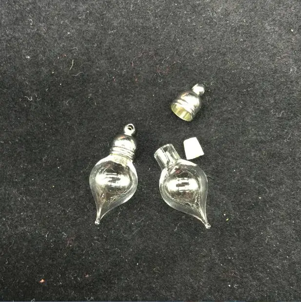 300pieces 27x11mm Transparent tear water drop glass vial pendant mini wishing glass bottle jar necklace pendant charms
300pieces 27x11mm Transparent tear water drop glass vial pendant mini wishing glass bottle jar necklace pendant charms