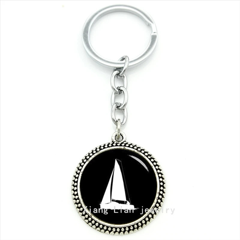 Trendy round men body jewelry keychain sailing ship sailing boat art pendant key ring jewelry sailor gift father's day gift T500
Trendy round men body jewelry keychain sailing ship sailing boat art pendant key ring jewelry sailor gift father's day gift T500