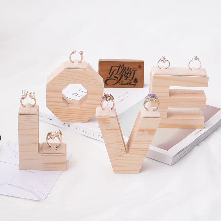 Solid Wood Ring Display Holder Jewelry Display Stand Word Love Style Ring Display Stand
Solid Wood Ring Display Holder Jewelry Display Stand Word Love Style Ring Display Stand