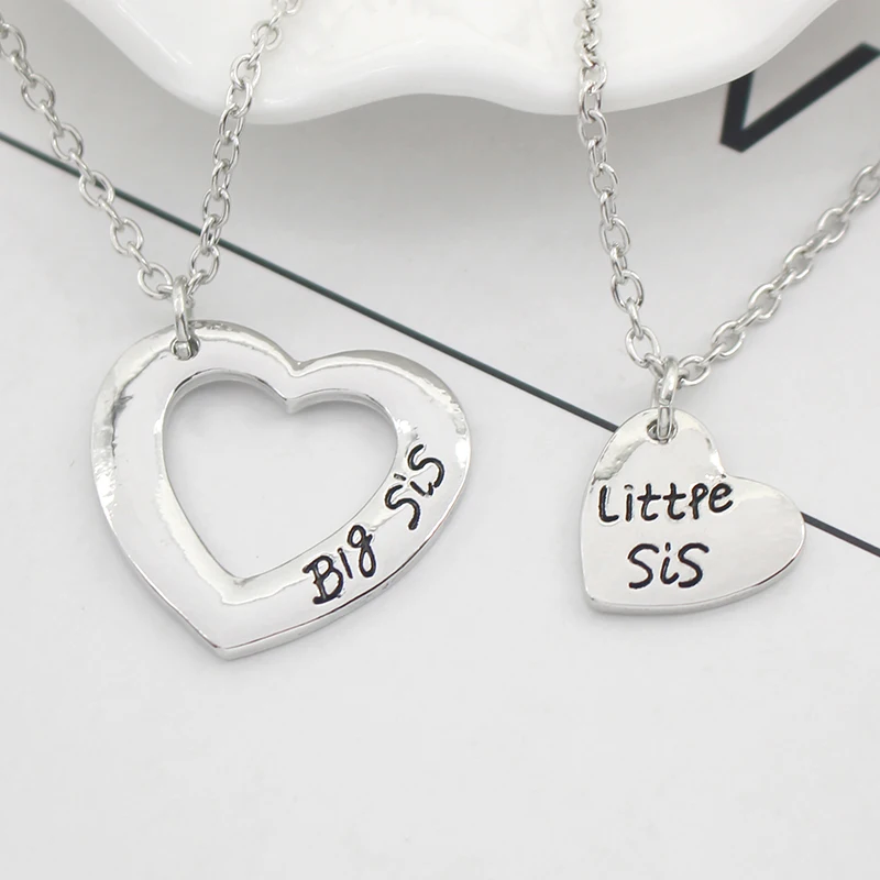 2Pcs/Set Big Sister Little Sister Necklace Family Double Hollow Love Heart Charm Necklace Best Friends BFF Sister Necklaces
2Pcs/Set Big Sister Little Sister Necklace Family Double Hollow Love Heart Charm Necklace Best Friends BFF Sister Necklaces