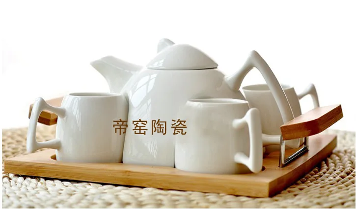 High-grade white porcelain tea sets with bamboo tray creative ceramic tea wholesale Kung Fu tea sets
High-grade white porcelain tea sets with bamboo tray creative ceramic tea wholesale Kung Fu tea sets