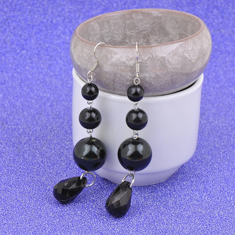 Pendientes largos de perlas simuladas grandes elegantes de moda para regalo de fiesta de boda
Pendientes largos de perlas simuladas grandes elegantes de moda para regalo de fiesta de boda