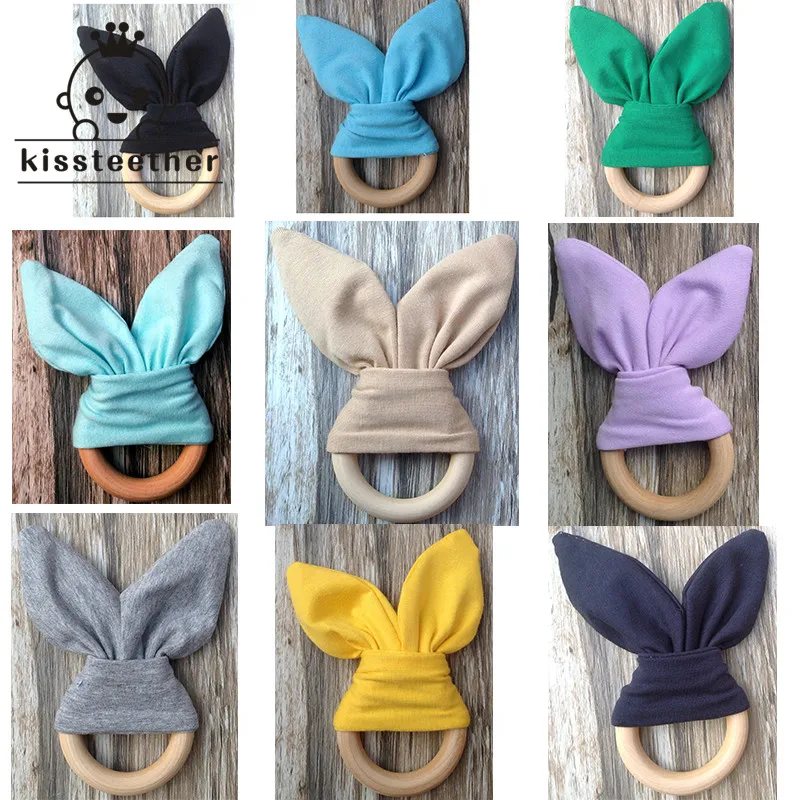 1pcs Bunny Ear Teether Wood Ring Teether Bell 68mm Natural Wood Teether Circle Fabric Wooden Teething training Baby Teether
1pcs Bunny Ear Teether Wood Ring Teether Bell 68mm Natural Wood Teether Circle Fabric Wooden Teething training Baby Teether