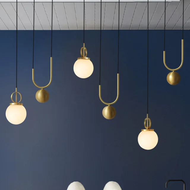 American Post modern Electroplating bronze Stretchable Glass pellet Chandelier Bedroom machine head Living room Coffee shop
American Post modern Electroplating bronze Stretchable Glass pellet Chandelier Bedroom machine head Living room Coffee shop