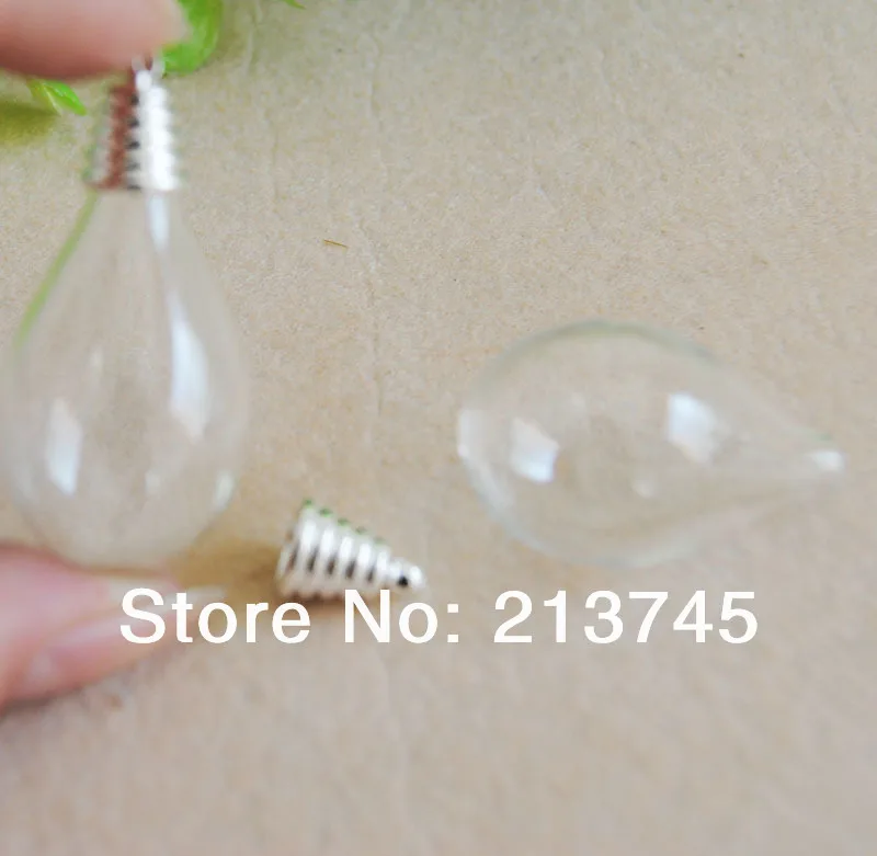 Free ship!!!perfect 50set/lot round 31*18mm glass globe ,Glass Dome Vial with silver cap set DIY (glass bottle/ vial pendant )
Free ship!!!perfect 50set/lot round 31*18mm glass globe ,Glass Dome Vial with silver cap set DIY (glass bottle/ vial pendant )