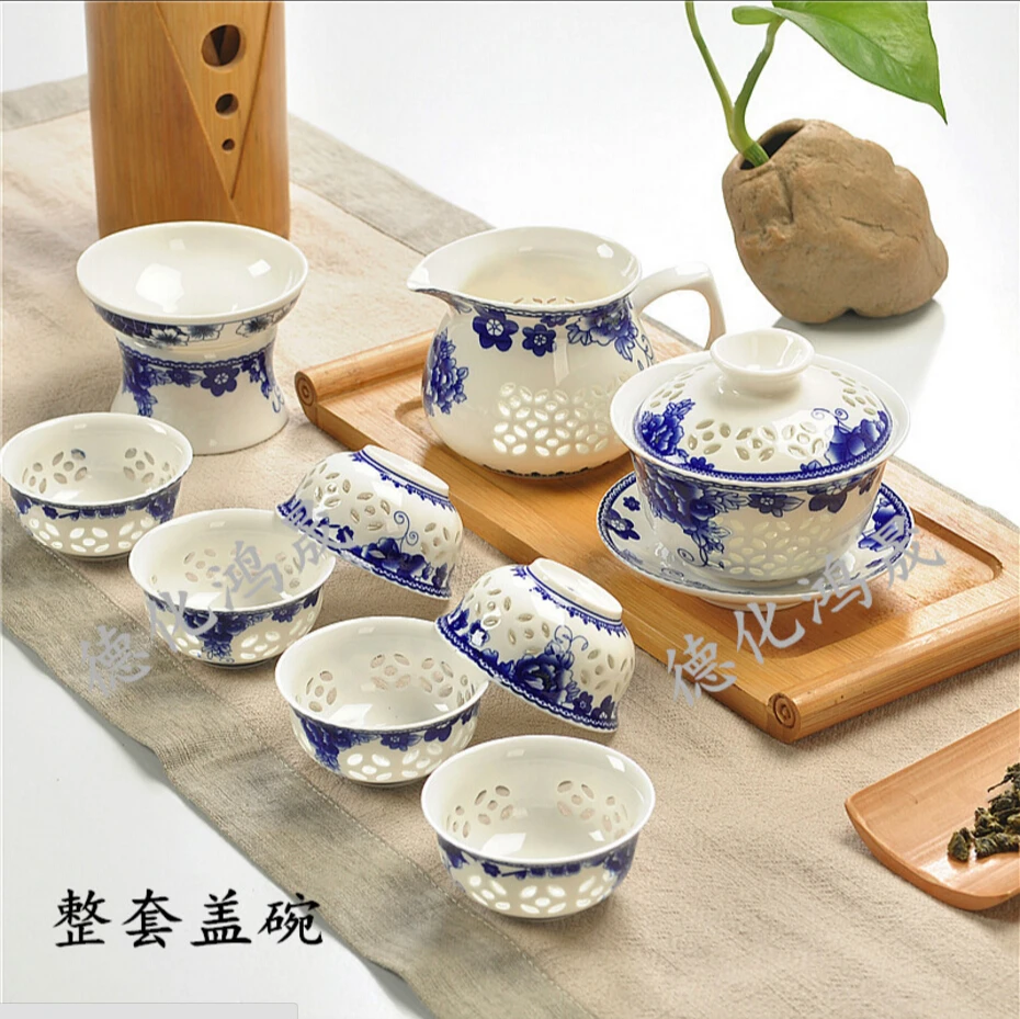 9 Pcs Kung Fu Tea Set,Ceramic Tea cup,Blue and White TeaPot,Bone China GaiWan,Tea Sea,Porcelain Filter Mug,Tea service
9 Pcs Kung Fu Tea Set,Ceramic Tea cup,Blue and White TeaPot,Bone China GaiWan,Tea Sea,Porcelain Filter Mug,Tea service