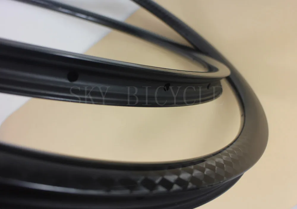 29er 12K Глянцевая поверхность mtb велосипедные диски 30 мм ширина 25 мм Глубокий бескамерный кросс-кантри светильник кие карбоновые велосипедные...
29er 12K Глянцевая поверхность mtb велосипедные диски 30 мм ширина 25 мм Глубокий бескамерный кросс-кантри светильник кие карбоновые велосипедные...