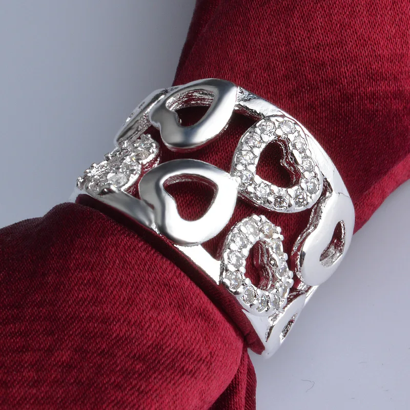 OMHXZJ Wholesale Personality Fashion OL Woman Girl Party Wedding Gift Hollow Heart AAA Zircon 925 Sterling Silver Ring RN136
OMHXZJ Wholesale Personality Fashion OL Woman Girl Party Wedding Gift Hollow Heart AAA Zircon 925 Sterling Silver Ring RN136