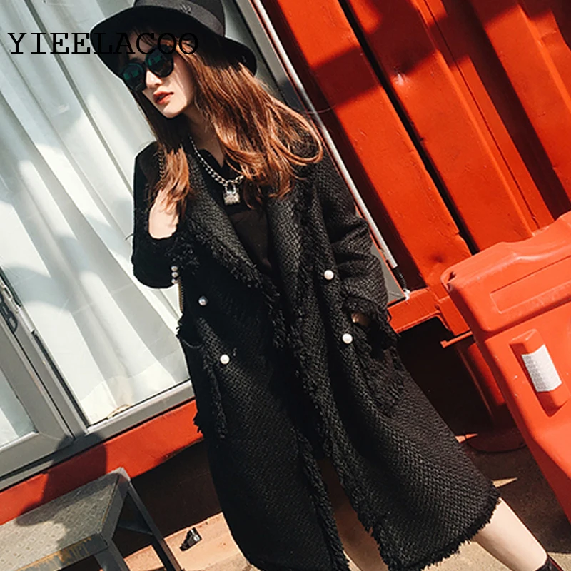 Black/white Woolen jacket autumn/winter women's jacket tweed two-color pearl buckle fringed side small fragrance in the long coa
Black/white Woolen jacket autumn/winter women's jacket tweed two-color pearl buckle fringed side small fragrance in the long coa
