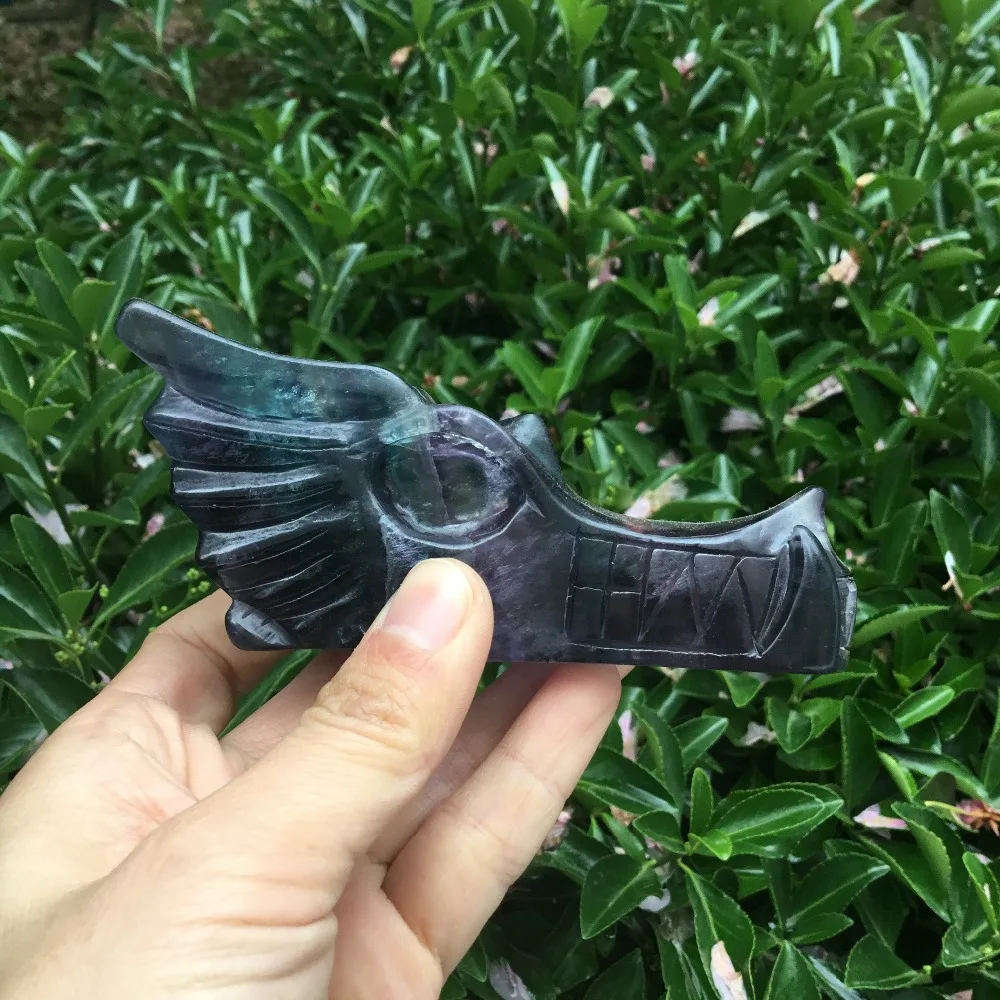 Natural fluorite crystal skull hand-carved rainbow fluorite crystal dragon skull Figurine
Natural fluorite crystal skull hand-carved rainbow fluorite crystal dragon skull Figurine