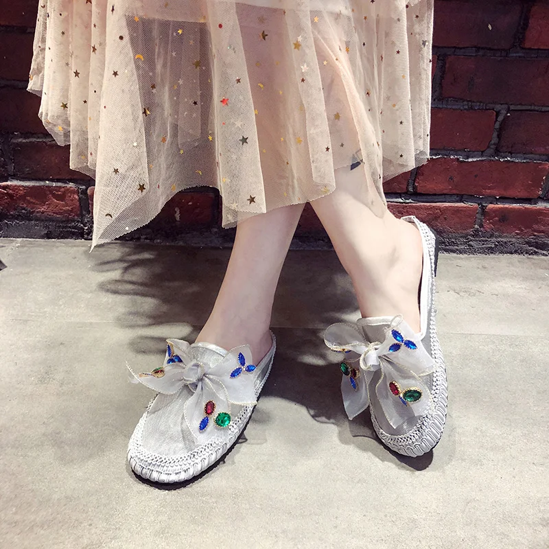 2019 summer new net red slippers female transparent mesh flat bottom wild bow wear lazy half slippers tide
2019 summer new net red slippers female transparent mesh flat bottom wild bow wear lazy half slippers tide